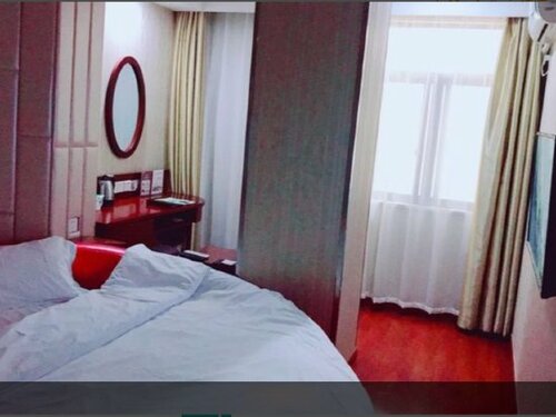 Гостиница GreenTree Inn ShangHai JinShan Wanda Plaza Longxiang Road Express Hotel в Шанхае
