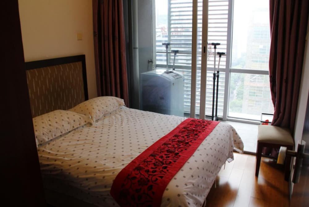 Фото Guangzhou Damei Apartment