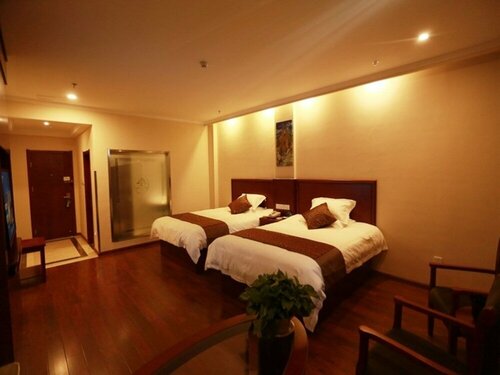 Гостиница GreenTree Inn Suzhou Si County Taoyuan Rd Hongcheng Garden Hotel в Сучжоу