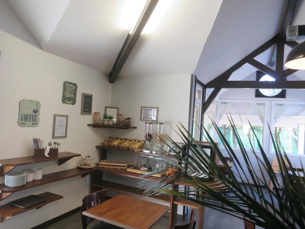 Фото Wood Inn Hôtel Aéroport Bordeaux-Mérignac