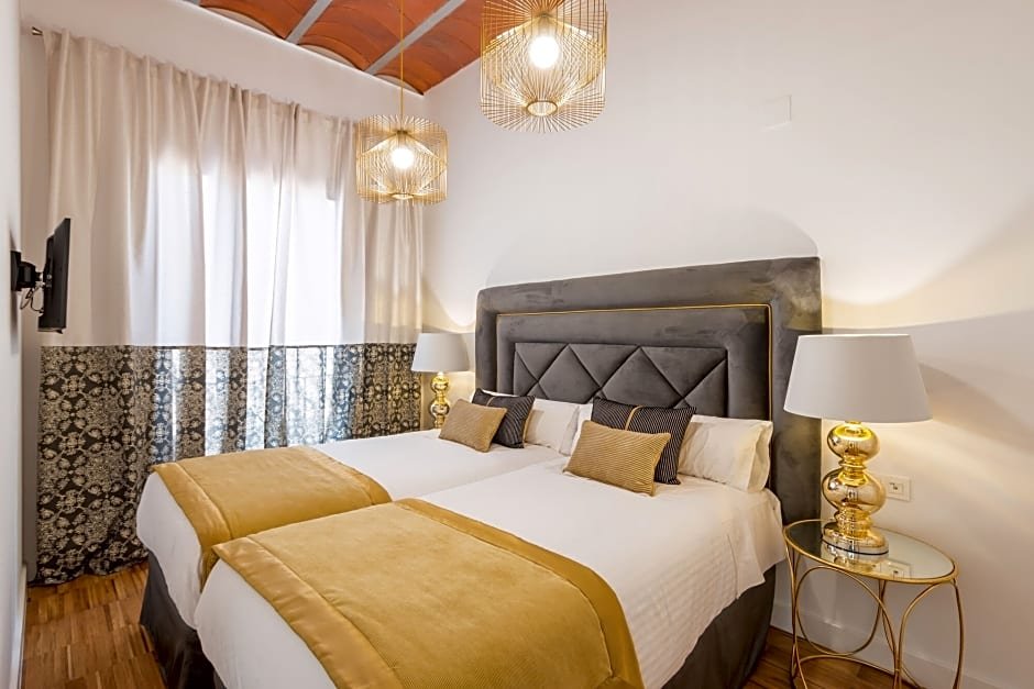 Фото Oro Del Darro Suites