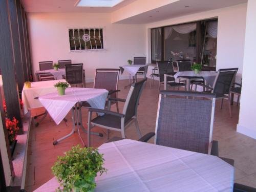 Фото Hotel Haus Am Berg