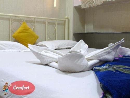 Фото Travellers Inn Mumbai