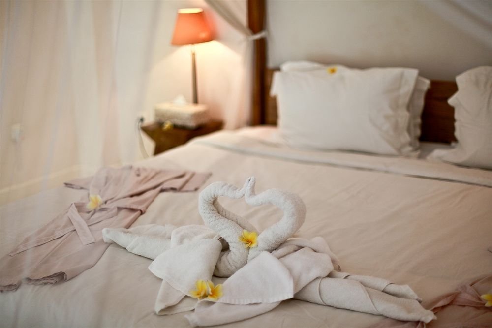 Фото Artini Cottages 1