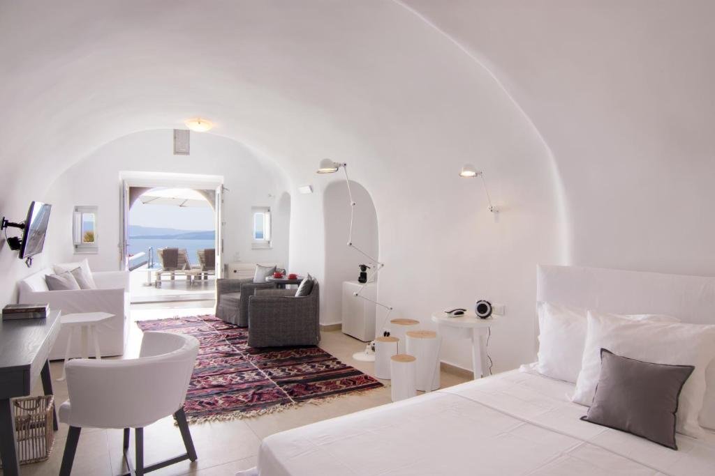 Фото Отель Santorini Secret Suites & Spa
