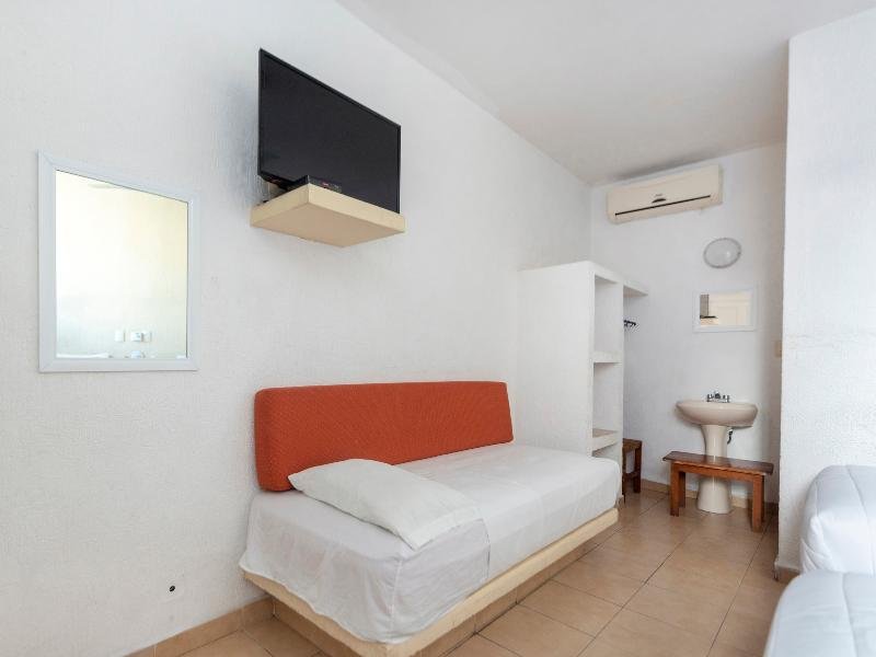 Фото Capital O Hotel El Mejicano