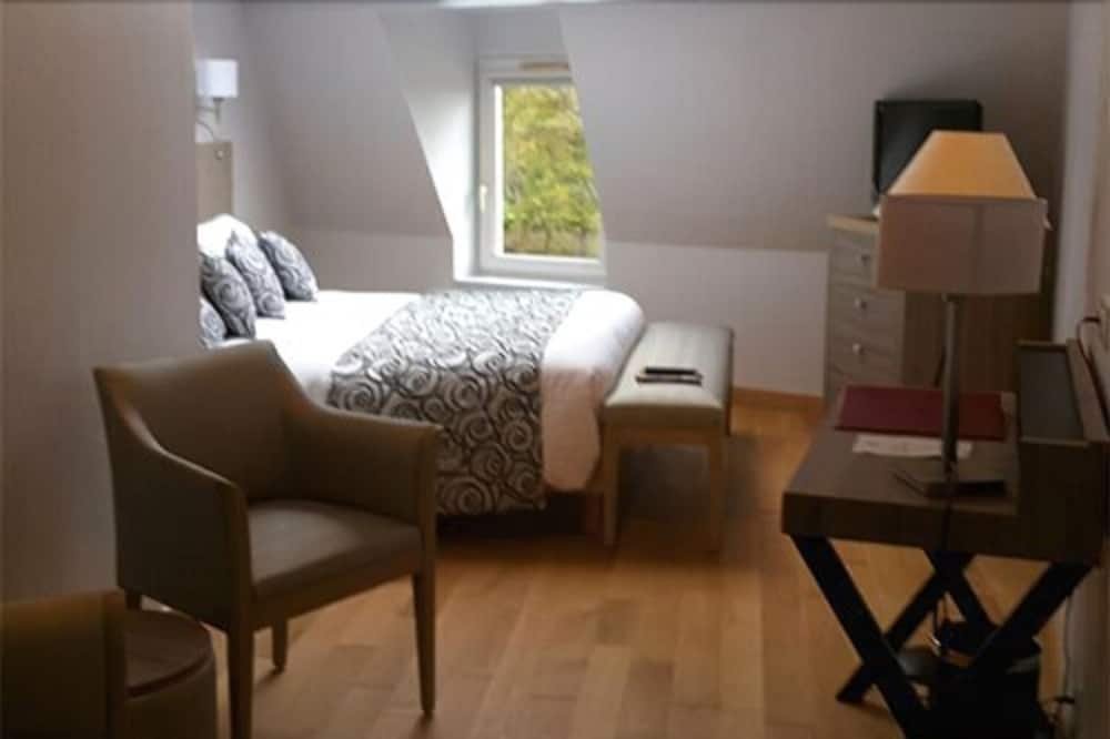 Фото Hôtel Les Remparts