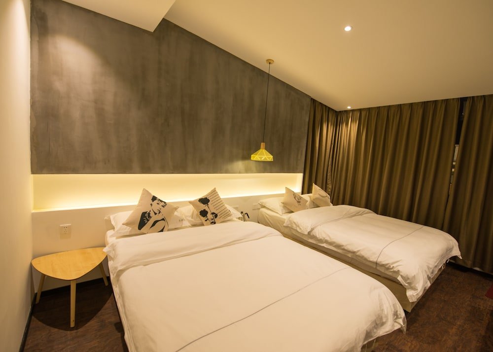 Фото Xiamen Feisu Tianchunshe Holiday Villa