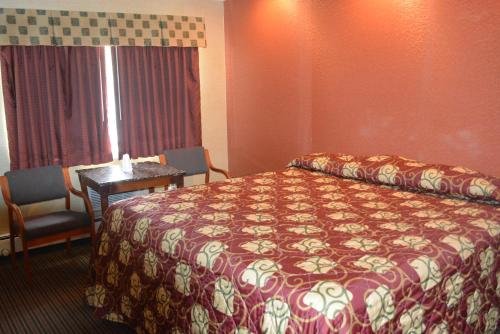 Фото Travelodge by Wyndham Avenel Woodbridge