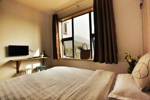 Гостиница Hangzhou High Tea Hostel в Ханчжоу