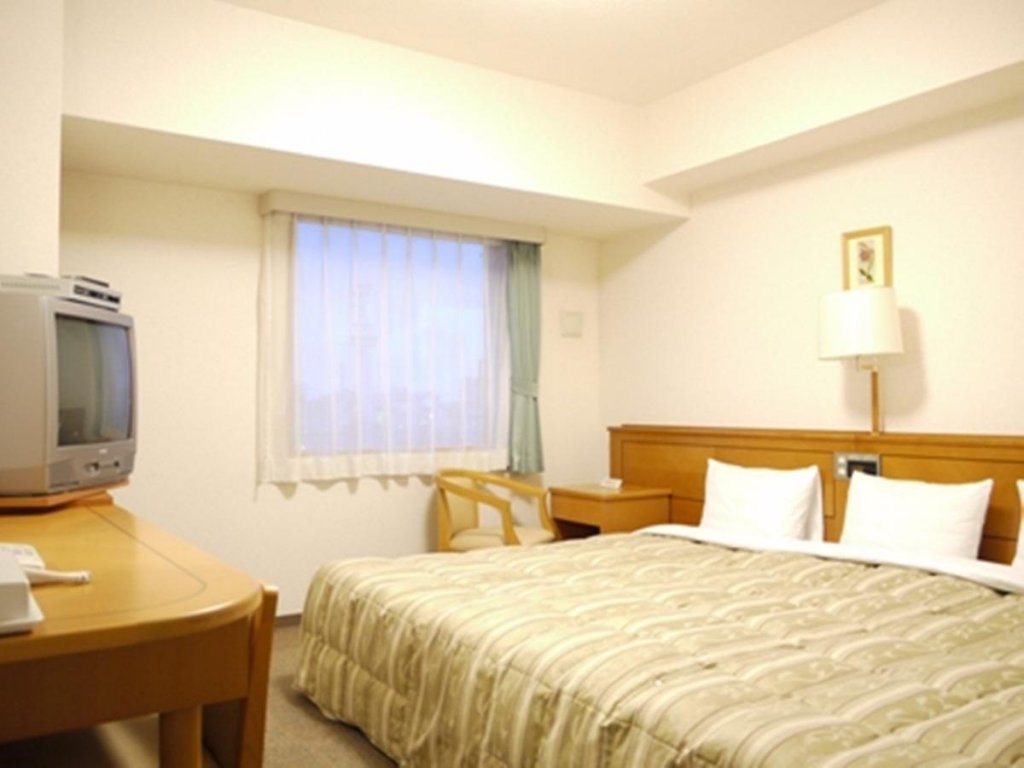 Фото Hotel Route Inn Niigata Kenchominami