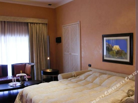 Фото Colosseo Studio Suites