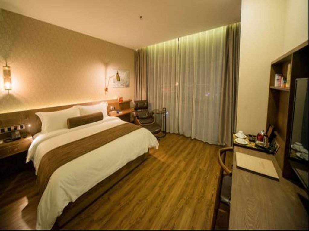 Фото James Joyce Coffee Hotel Suzhou Mudu Subway Station Branch