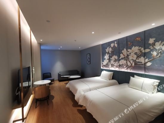 Фото Magnotel Jining Jiaxiang, Zengzi Avenue Hotel
