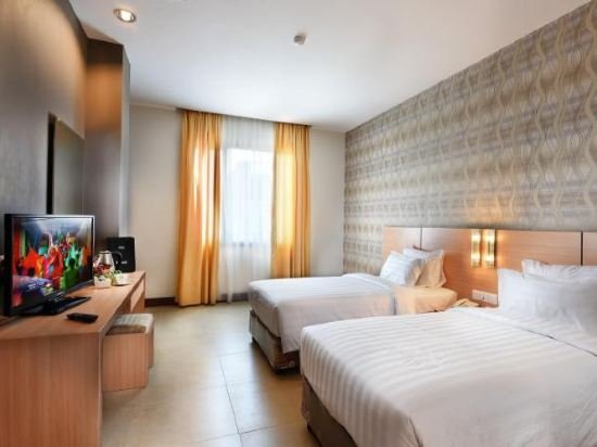 Фото Grand Impression Hotel Medan