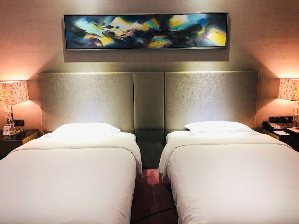 Фото La Perle International Hotel