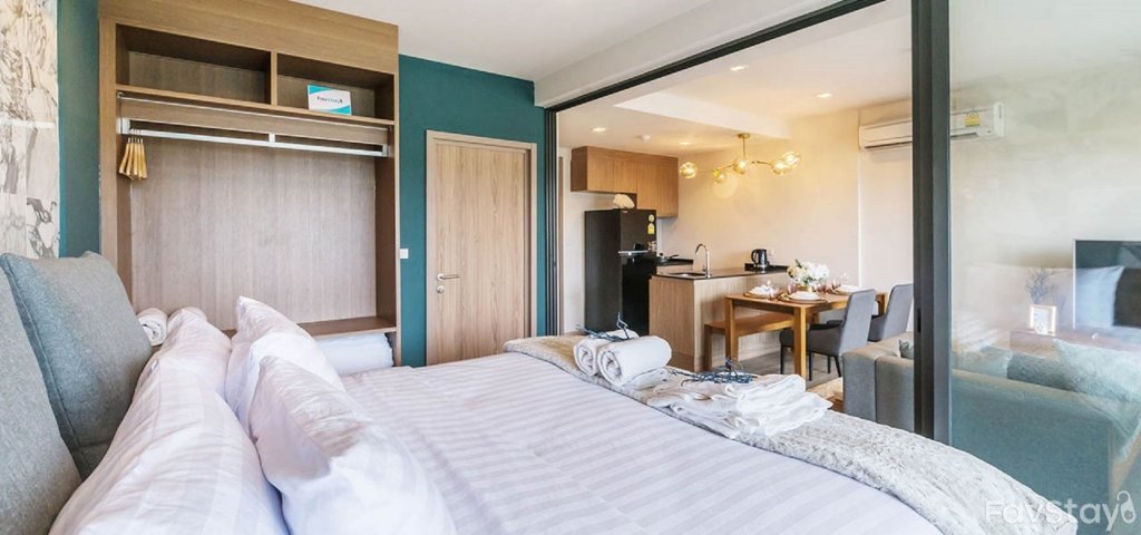 Фото Charming Pool View by Rain Cha Am Condo