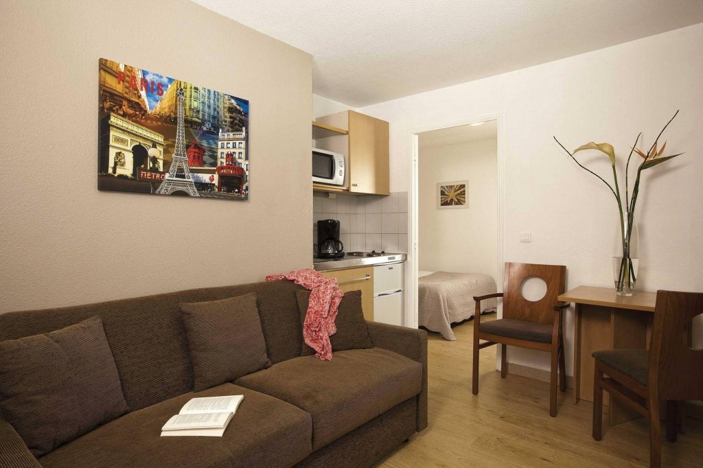 Фото Séjours & Affaires Charles de Gaulle