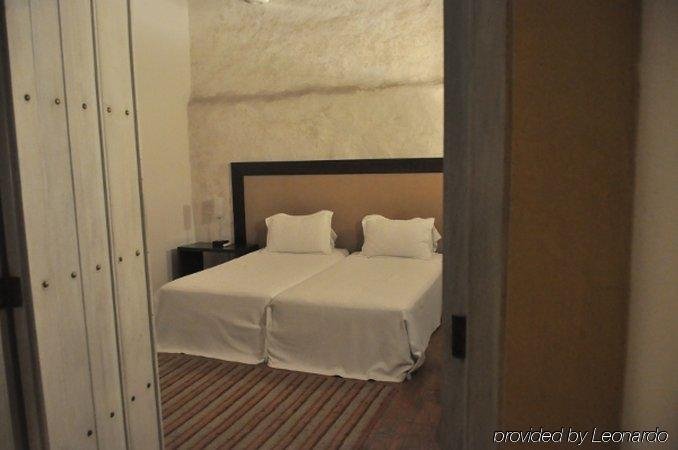 Фото Hotel El Candil de los Santos