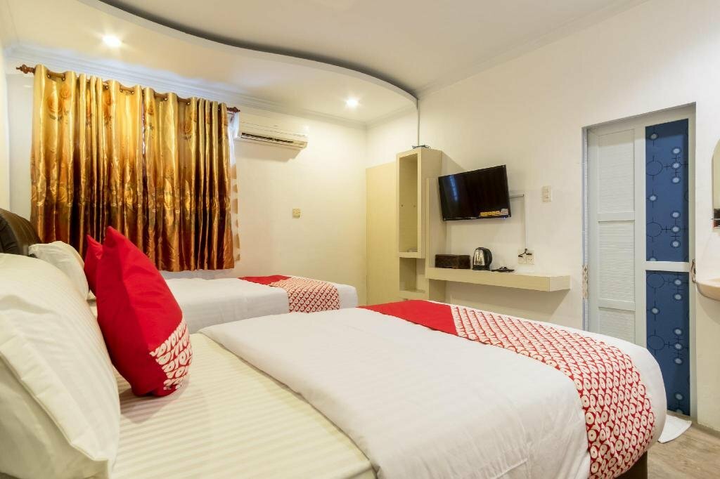 Hotel Oyo 619 Naufal Guest House Syariah, Medan, photo