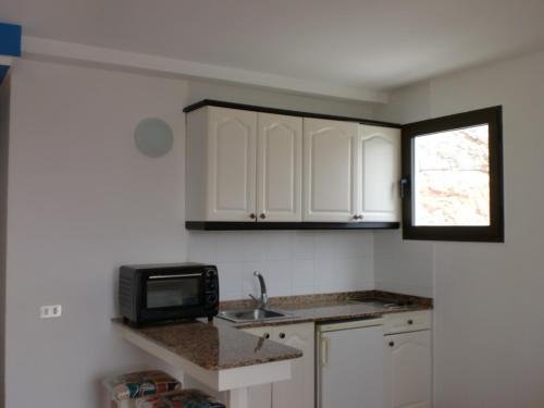 Фото Apartamentos Puerto Bello