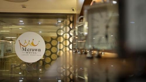 Фото M Crown Hotel