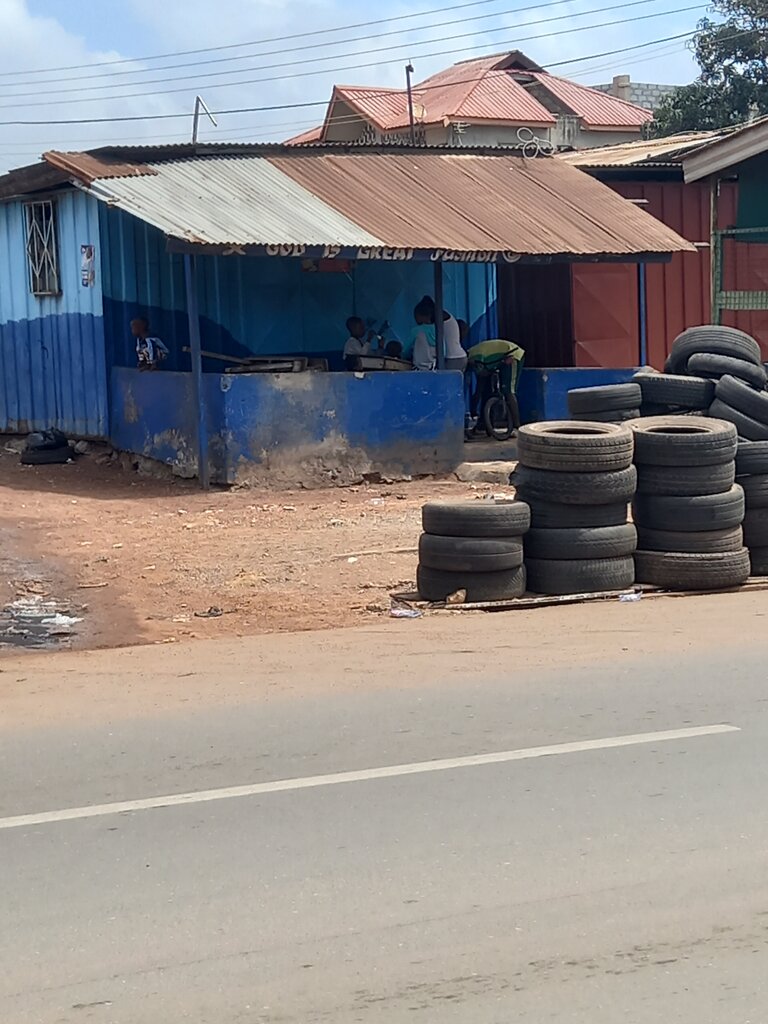 Tailor God is great fashion, Accra, photo