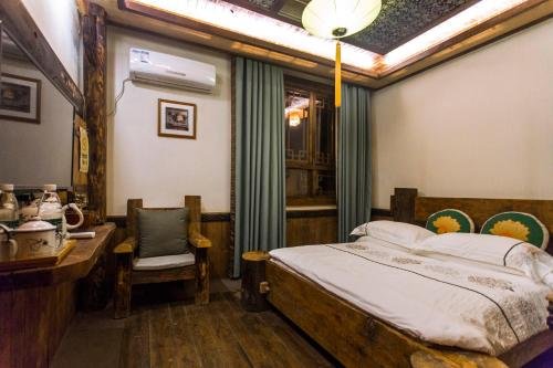 Фото Dielianhua Cowherd Inn Zhangjiajie