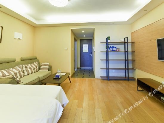 Фото Wanke City International Apartment