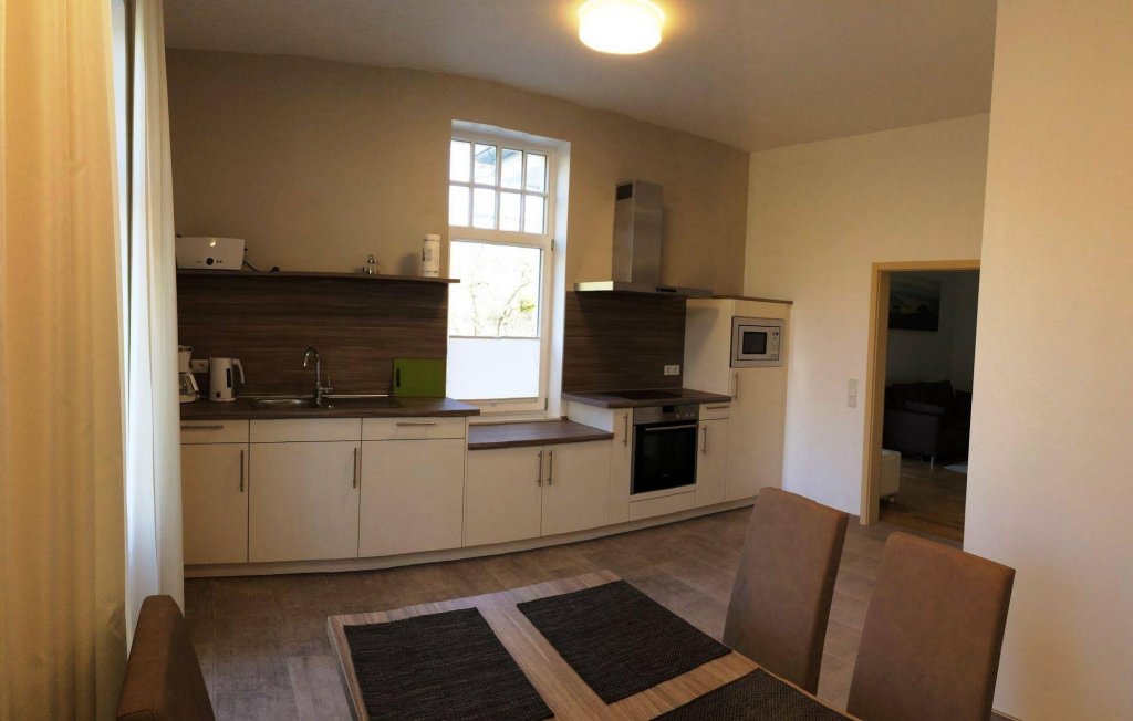 Фото Appartements Am Kurpark