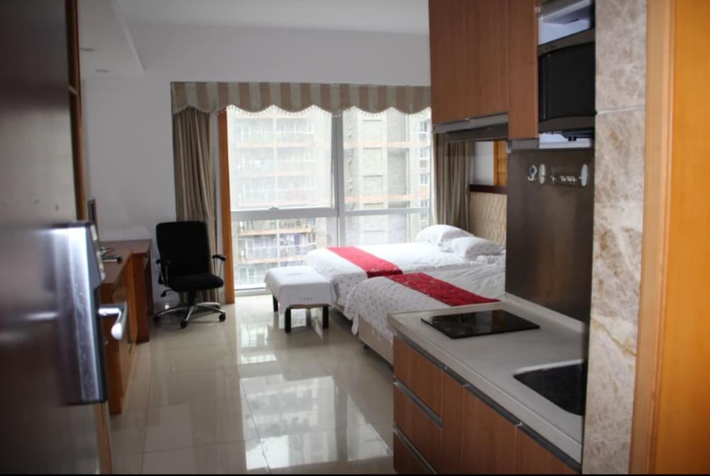 Фото Guangzhou Damei Apartment