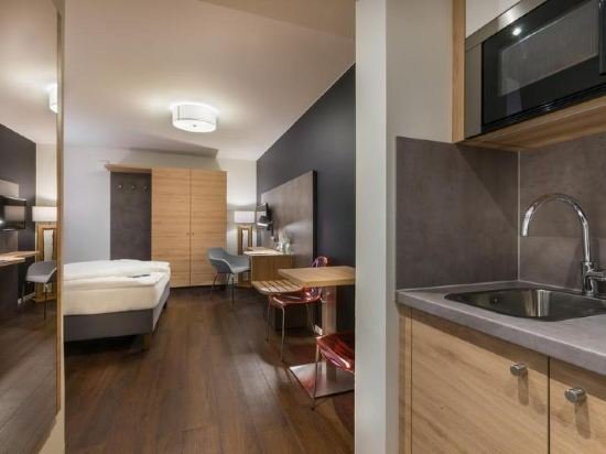 Фото Signature East Hotel Apartment