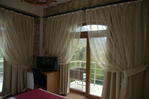 Гостиница Onar Village в Кирении