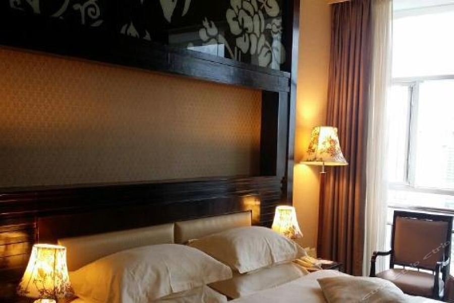 Фото Economic Trade Hotel