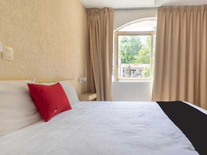 Фото Capital O Hotel El Mejicano