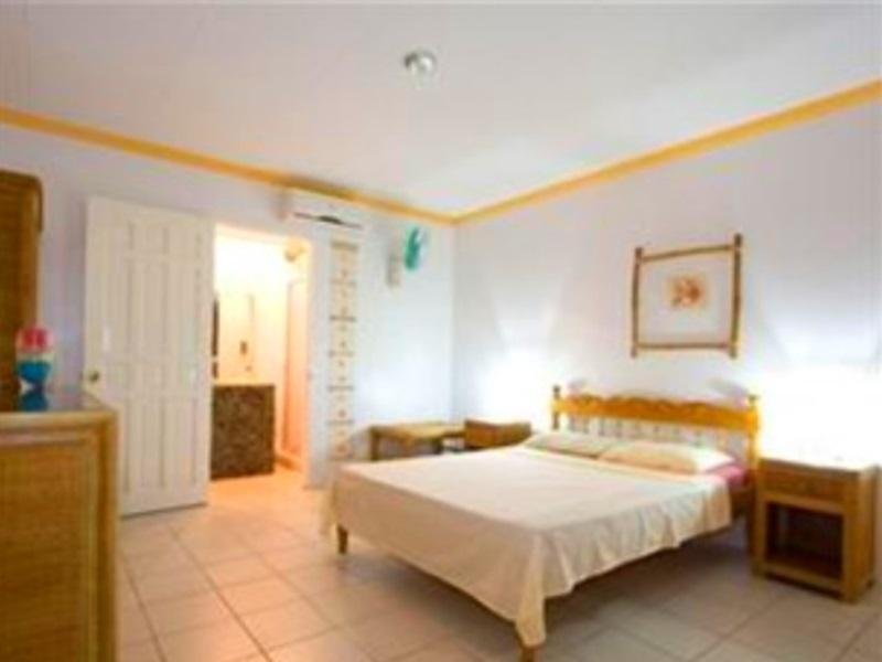 Фото Whispering Palms Island Resort