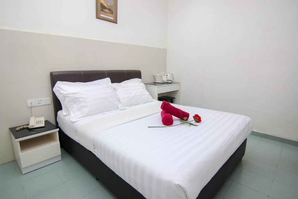 Фото Rose Cottage Hotel Taman Johor Jaya
