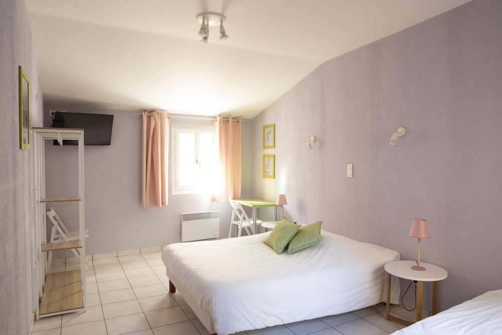 Фото L'Aptois Hotel