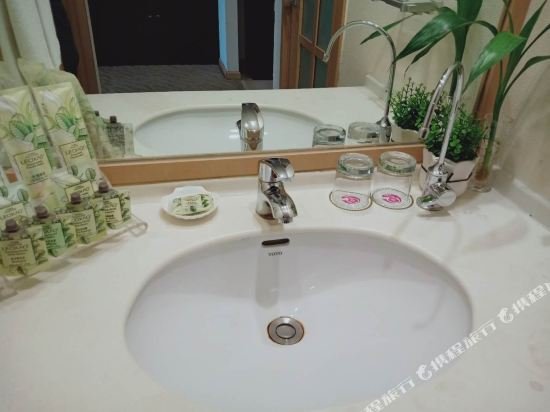 Фото Dalian Precious Ginza Hotel