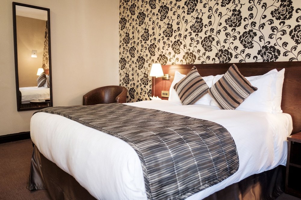 Фото The Sanctuary House Hotel