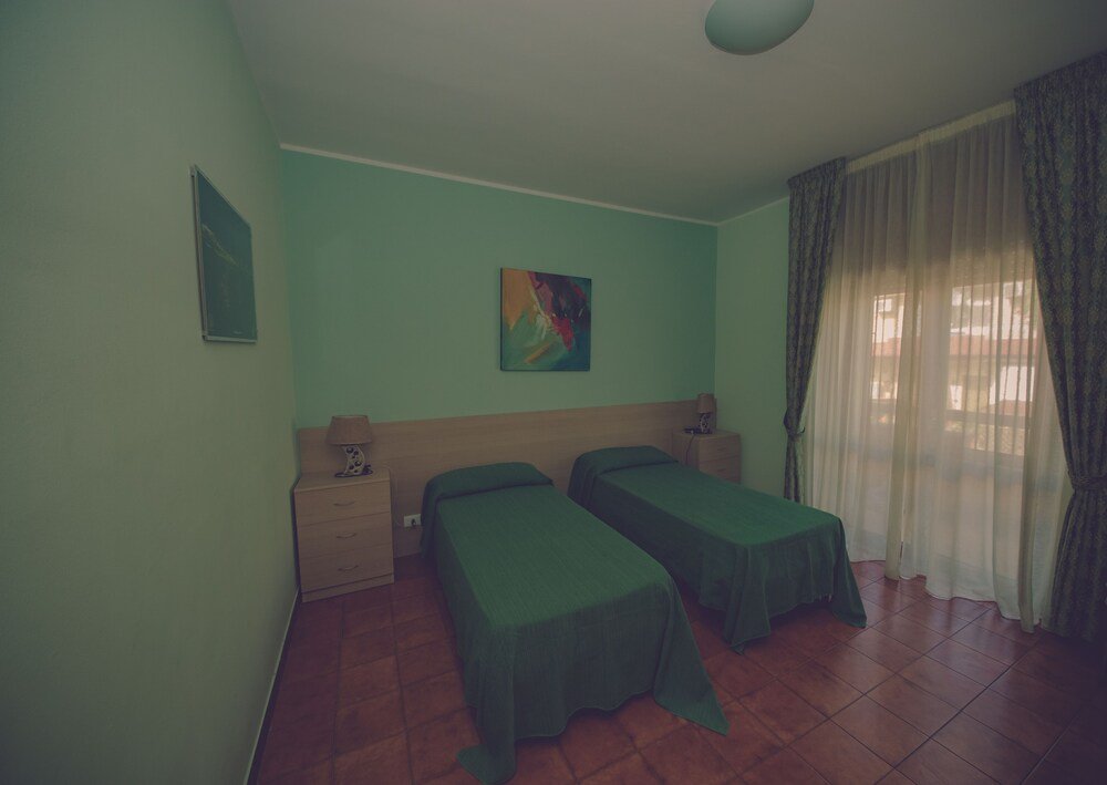 Фото Cassiodoro Rooms Affittacamere