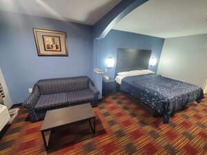 Гостиница Scottish Inns and Suites East Sam Houston Pkwy