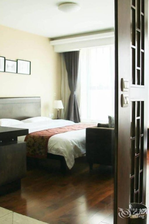 Фото World City Jiamei Service Apartment