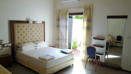 Гостевой дом Thoddoo Inn на Тодду