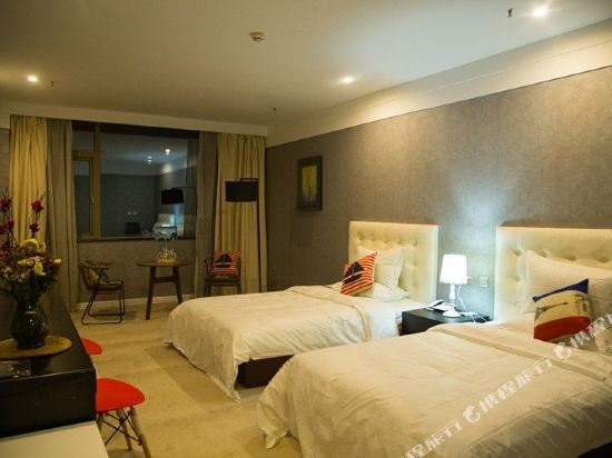 Фото Luoyang Yilu Gangwan Hotel