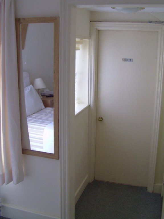 Фото Swiss Cottage Bed And Breakfast