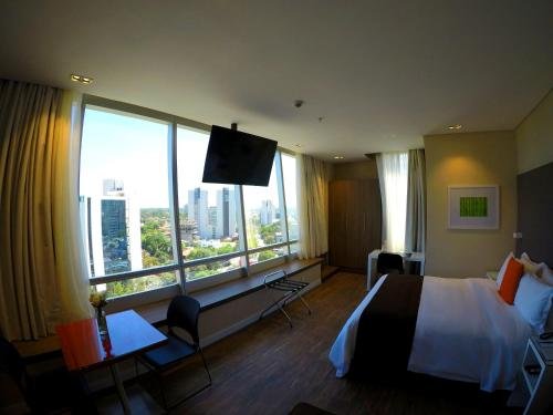 Фото Paseo La Galería Hotel & Suites