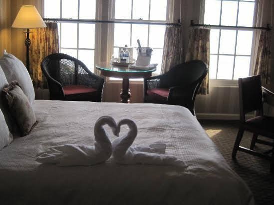 Фото Cottage Inn by The Sea