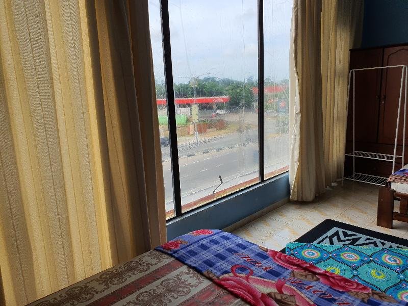 Фото Spot On 89920 Muwaffaq Inn