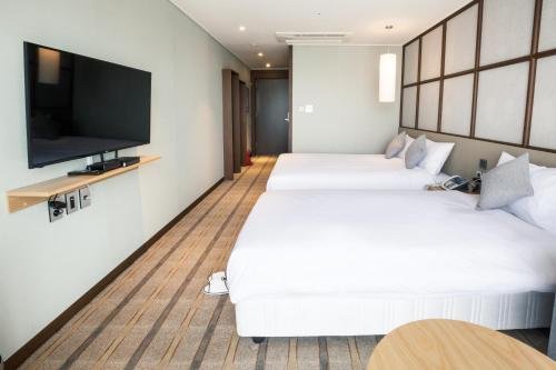 Фото Shinshin Hotel Cheonjiyeon